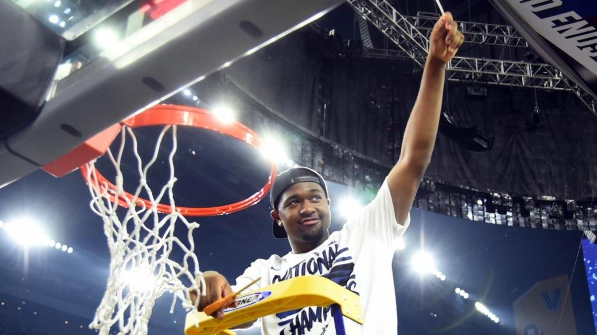 Kris Jenkins cut down the net after his three-point basket at the buzzer lifted Villanova over North Carolina in last season’s NCAA championship game.