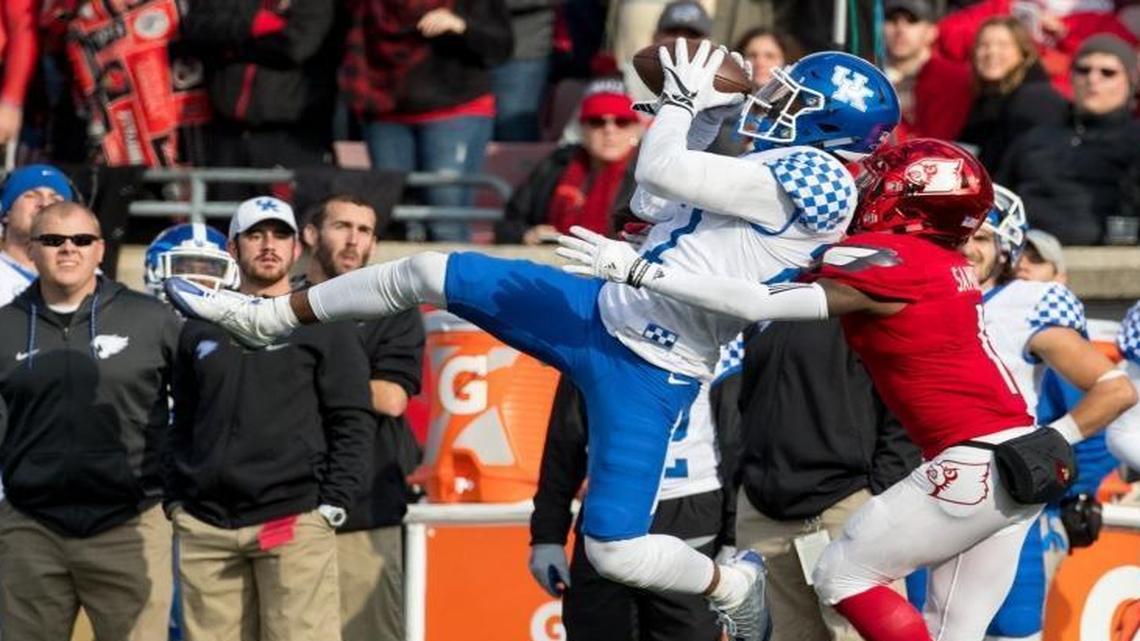 Kentucky safety Mike Edwards intercepted a pass intended for Louisville wide receiver Traveon Samuel in the third quarter Saturday at Papa John's Cardinal Stadium in Louisville. Kentucky won the game 41-38.