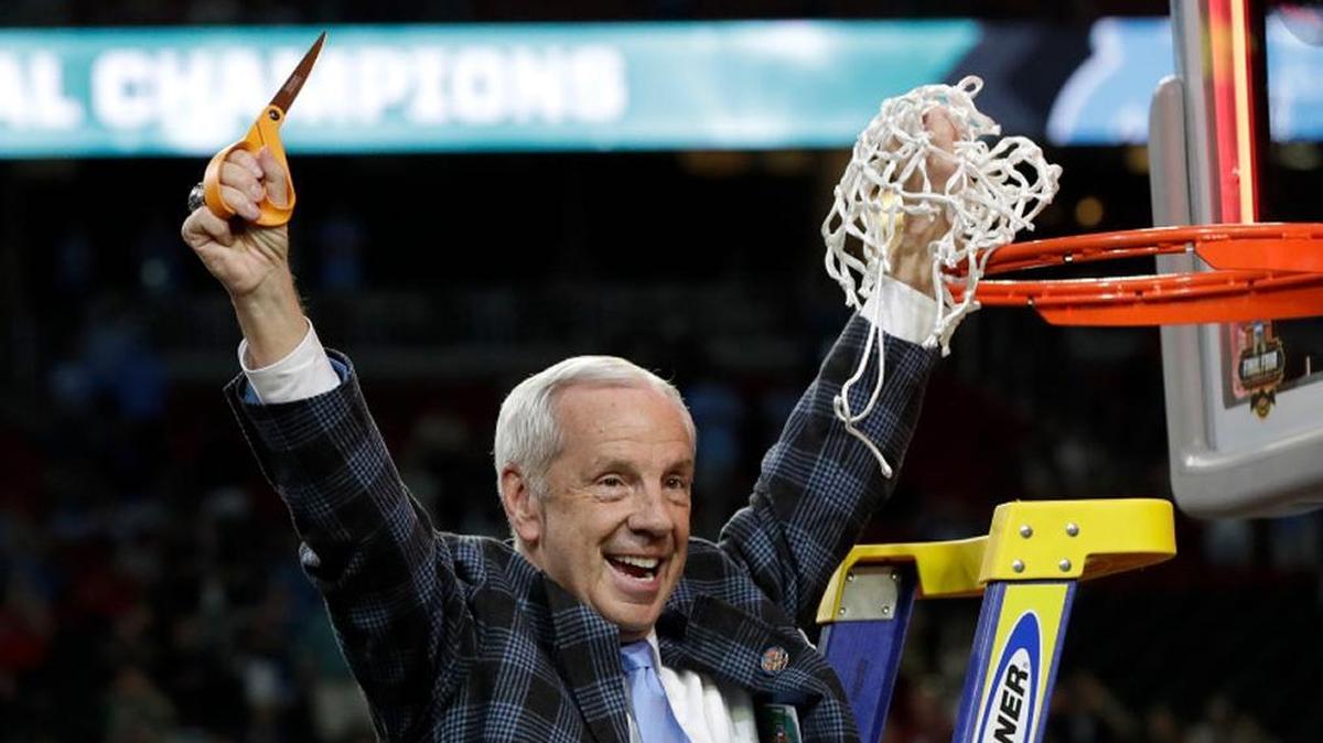 North Carolina head coach Roy Williams cut down the net after his team defeated Gonzaga to win the national championship last April in Glendale, Ariz.