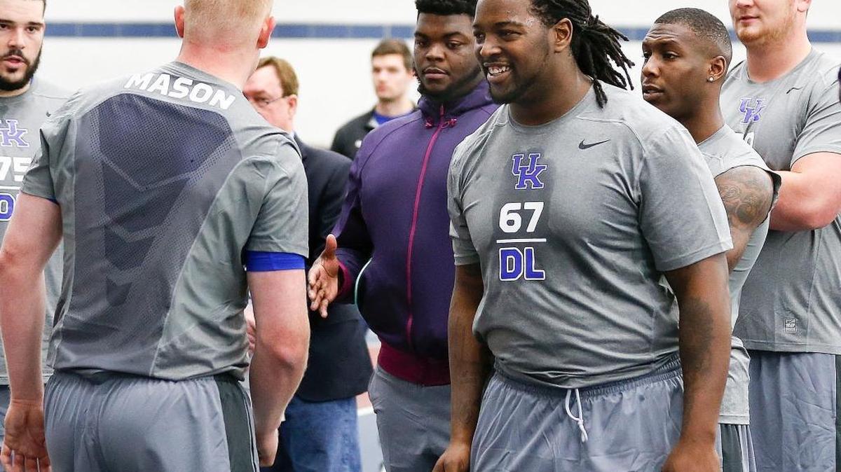 Kentucky Wildcats defensive tackle Cory Johnson (67) and teammates prepared to lift weights during University of Kentucky football NFL Pro Day held in the Nutter Indoor Facility on the UK campus in Lexington, Ky., Friday, March 4, 2016.