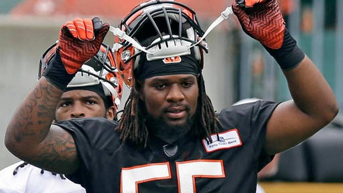 Cincinnati Bengals outside linebacker Vontaze Burfict adjusts his helmet during a 2014 NFL football mandatory minicamp in Cincinnati. Burfict returns from a three-game suspension when the Bengals play host to Miami on Thursday night.
