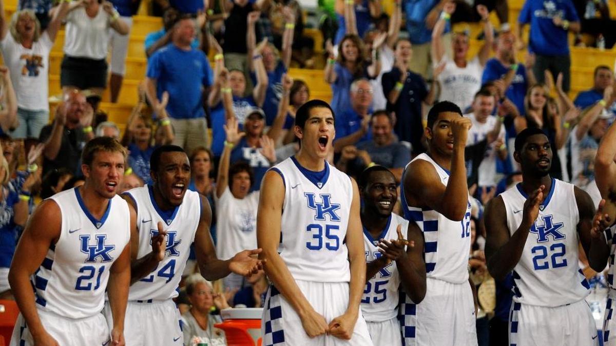 UK players and fans reacted after Tyler Ulis stole the ball and made a layup that sealed the win for the Cats over Chalon-Reims on Aug. 16, 2014, in Nassau, Bahamas.