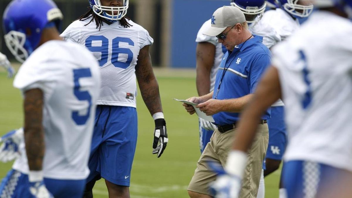 For head football coach Mark Stoops, who is heading into his fourth year at UK, the bottom line is what counts.