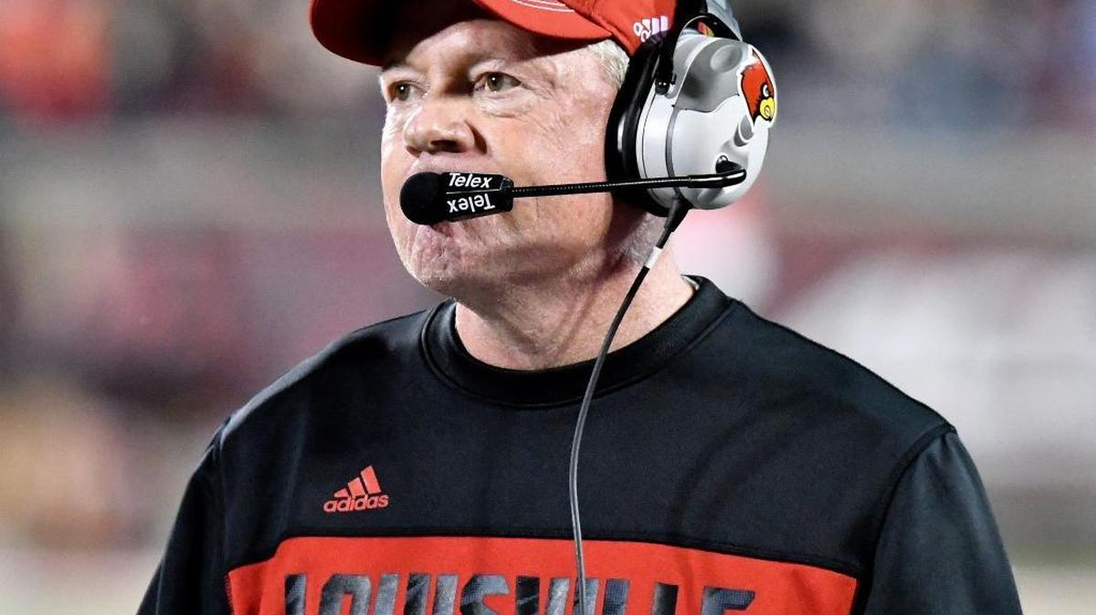 Louisville Coach Bobby Petrino watched his team in the second half against Duke on Friday. The Cardinals won 24-14 despite sloppy play.