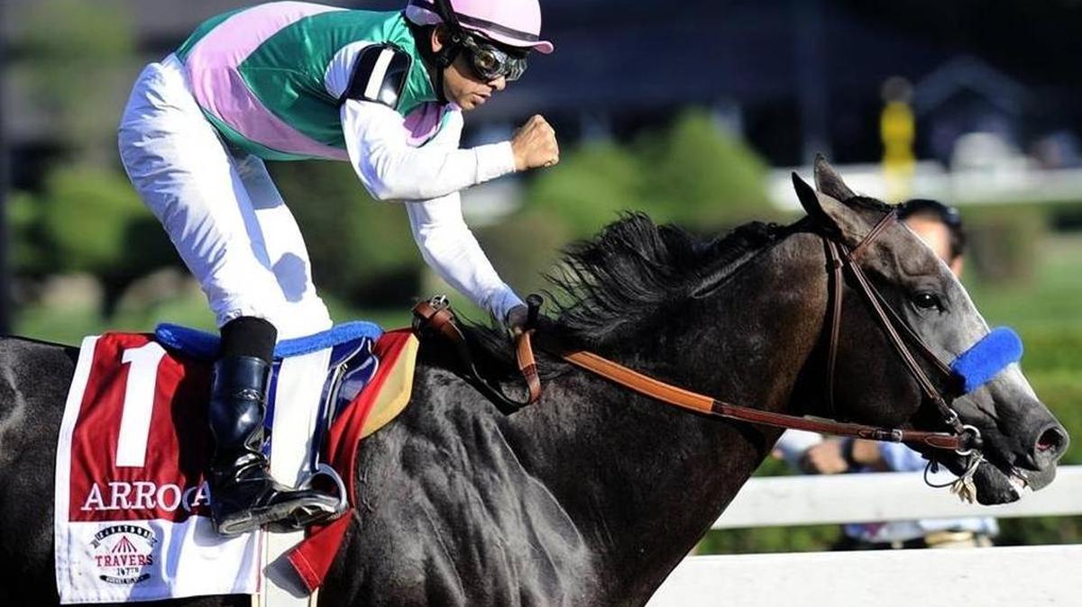 Jockey Mike Smith celebrated after Arrogate won the Travers Stakes last August at Saratoga. The Breeders’ Cup Classic champion will face California Chrome again in Saturday’s Pegasus World Cup at Gulfstream Park.