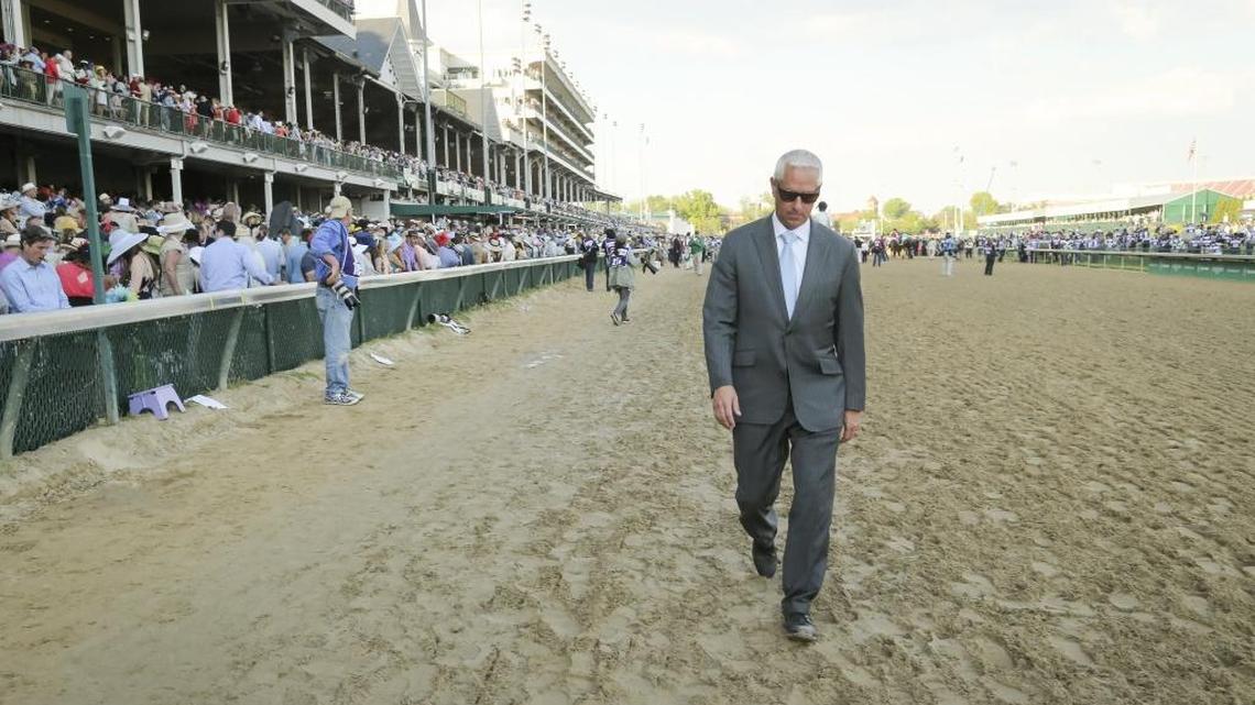 Trainer Todd Pletcher walks back to the barns after being bested by American Pharoah and jockey Victor Espinoza who won the 141st running of the Kentucky Derby at Churchill Downs May 2, 2015.