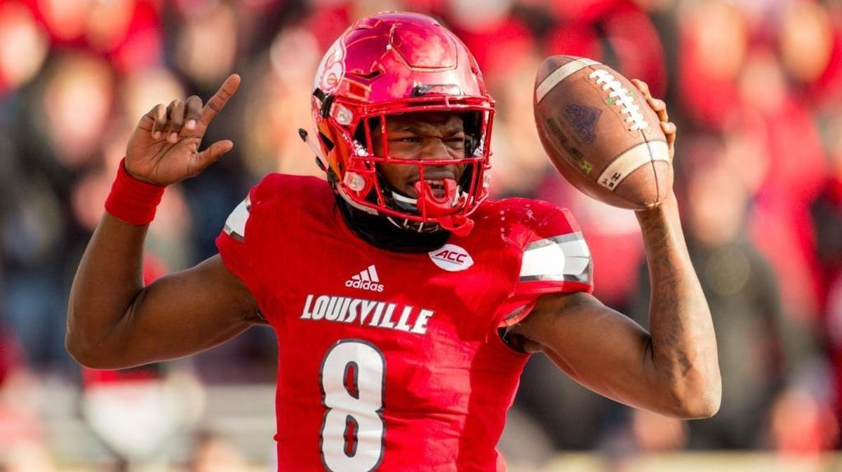 Louisville quarterback Lamar Jackson celebrates a score during U of L’s 41-38 loss to Kentucky on Saturday, Nov. 26, 2016 at Papa John's Cardinal Stadium in Louisville.