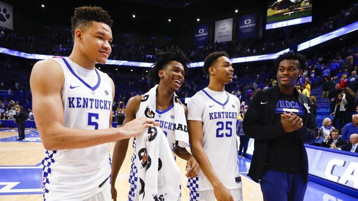 Kentucky forward Kevin Knox (5), guard Shai Gilgeous-Alexander (22), forward PJ Washington (25) and forward Jarred Vanderbilt (2) celebrate following the team’s exhibition game against the Centre Colonels at Rupp Arena in Lexington, Ky., Friday, Nov. 3, 2017. Kentucky beat Centre College 106-63.