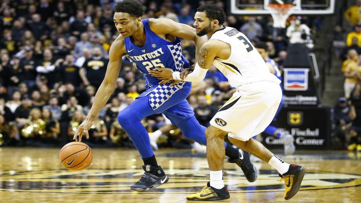 Kentucky forward PJ Washington (25) drives past Missouri Tigers guard Kassius Robertson (3) during UK’s 69-60 loss at Mizzou Arena in Columbia, Mo., Saturday, Feb. 3 2018.