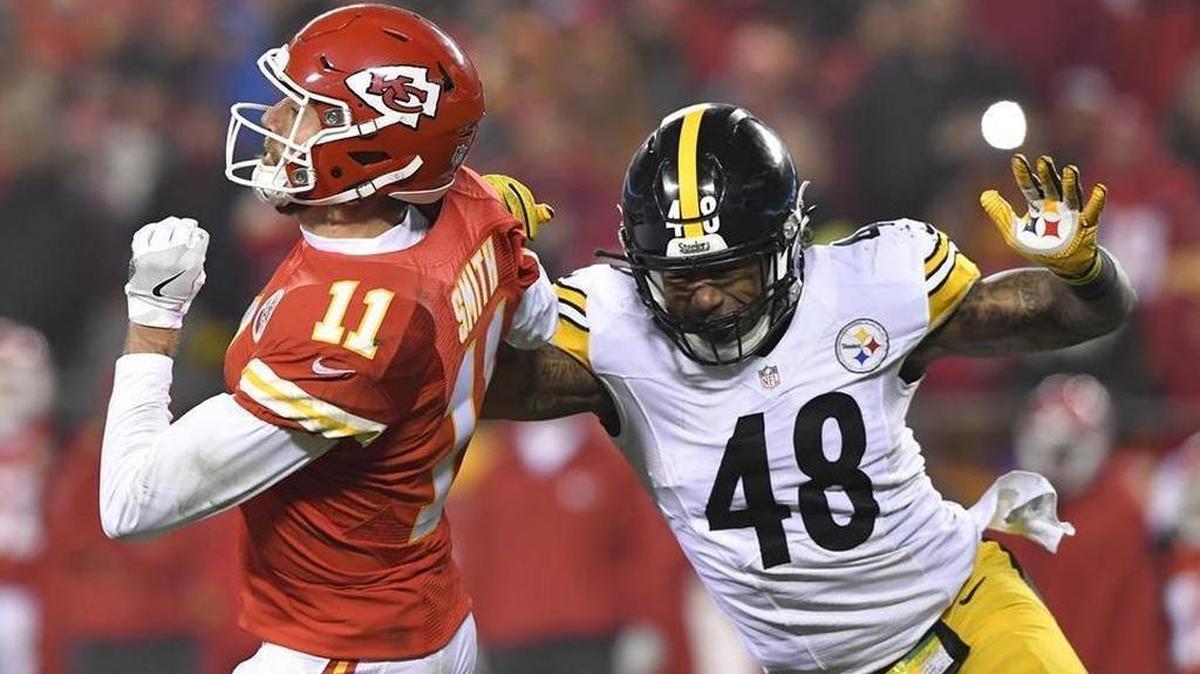 Steelers outside linebacker Bud Dupree hit Chiefs quarterback Alex Smith while Smith was attempting a pass and the ball popped up in the air and was intercepted by Ryan Shazier in the second quarter of Sunday’s divisional-playoff game at Arrowhead Stadium.