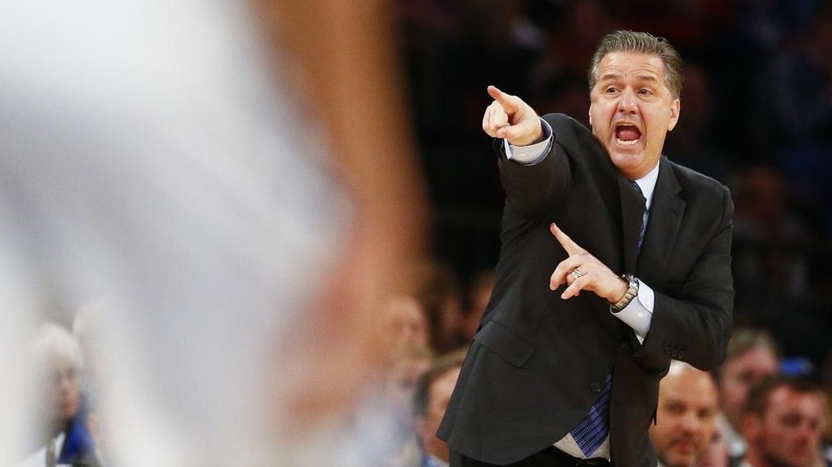 Kentucky head basketball coach John Calipari yells down court during the Citi Hoops Classic against the Monmouth Hawks at Madison Square Garden in New York, Saturday, Dec. 9, 2017. Kentucky won the game 93-76.