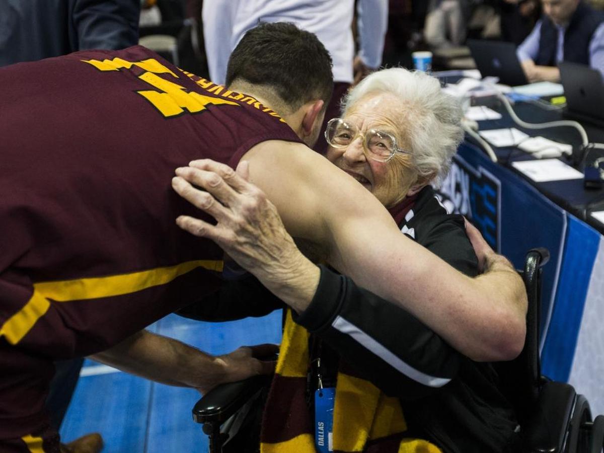 Sister Jean Dolores-Schmidt, a nun and Loyola Ramblers super fan, celebrated with the team after its first-round win over Miami in 2018. She is back at age 102 for the 2022 tournament.