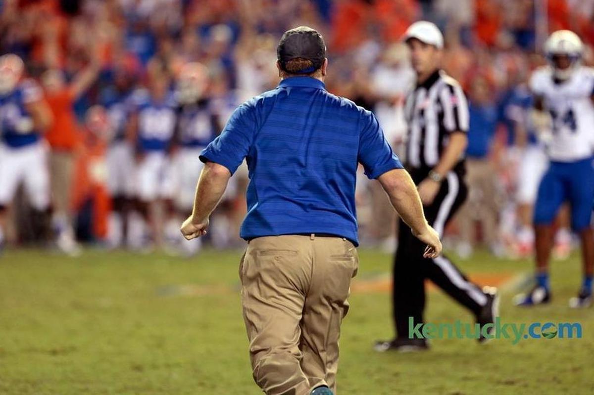 Kentucky head coach Mark Stoops ran on the field to protest Florida’s touchdown in overtime as he thought the play clock had run out before the snap in the Gators’ triple-overtime win on Sept. 13, 2014.