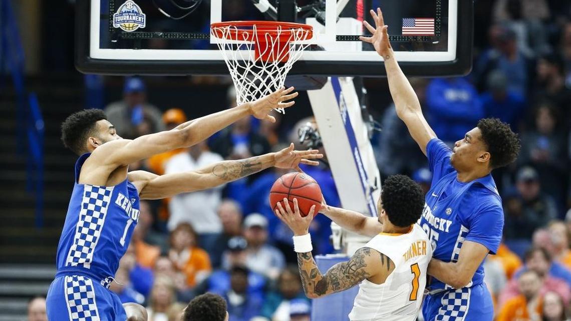 Kentucky forwards Sacha Killeya-Jones, left, and PJ Washington defended Tennessee guard Lamonte Turner, center, during the Cats’ 77-72 win in the SEC Tournament finals on March 11 in the Scottrade Center in St. Louis.