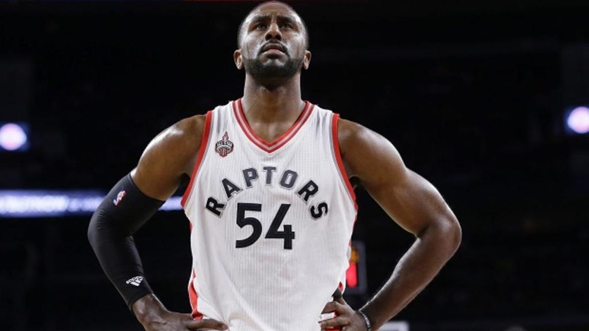 Toronto Raptors forward Patrick Patterson looks towards the scoreboard during the second half of an NBA basketball game against the Detroit Pistons, Sunday, Feb. 28, 2016, in Auburn Hills, Mich.