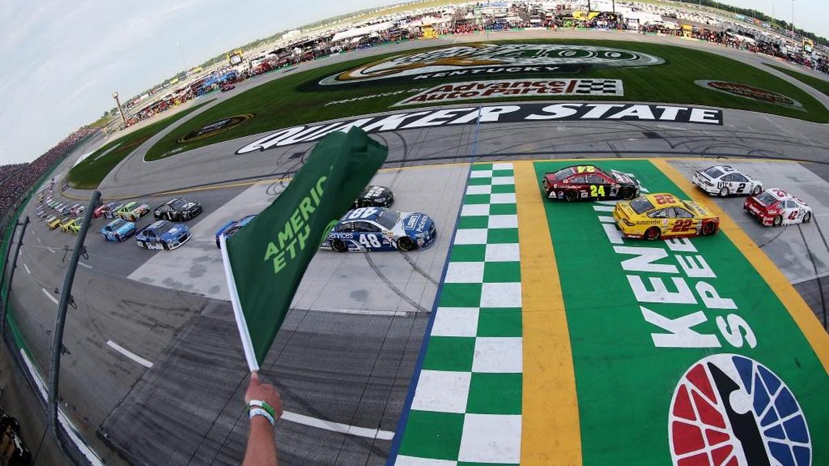 Kyle Larson (42) and Brad Keselowski (2) led the field to the green flag for the NASCAR Sprint Cup race at Kentucky Speedway on July 11, 2015, in Sparta.