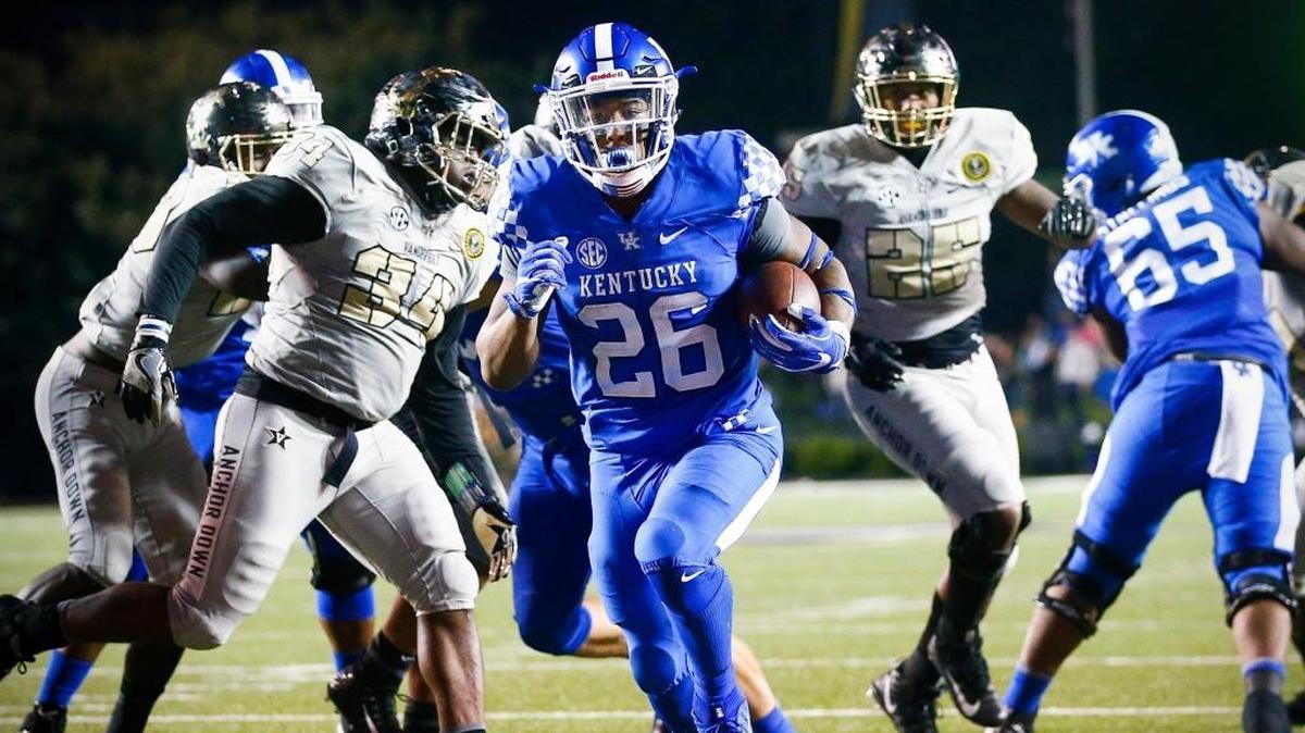 Kentucky star running back Benny Snell (26) will try to help the Wildcats continue their recent mastery of SEC East foes Missouri, South Carolina and Vanderbilt in 2018.