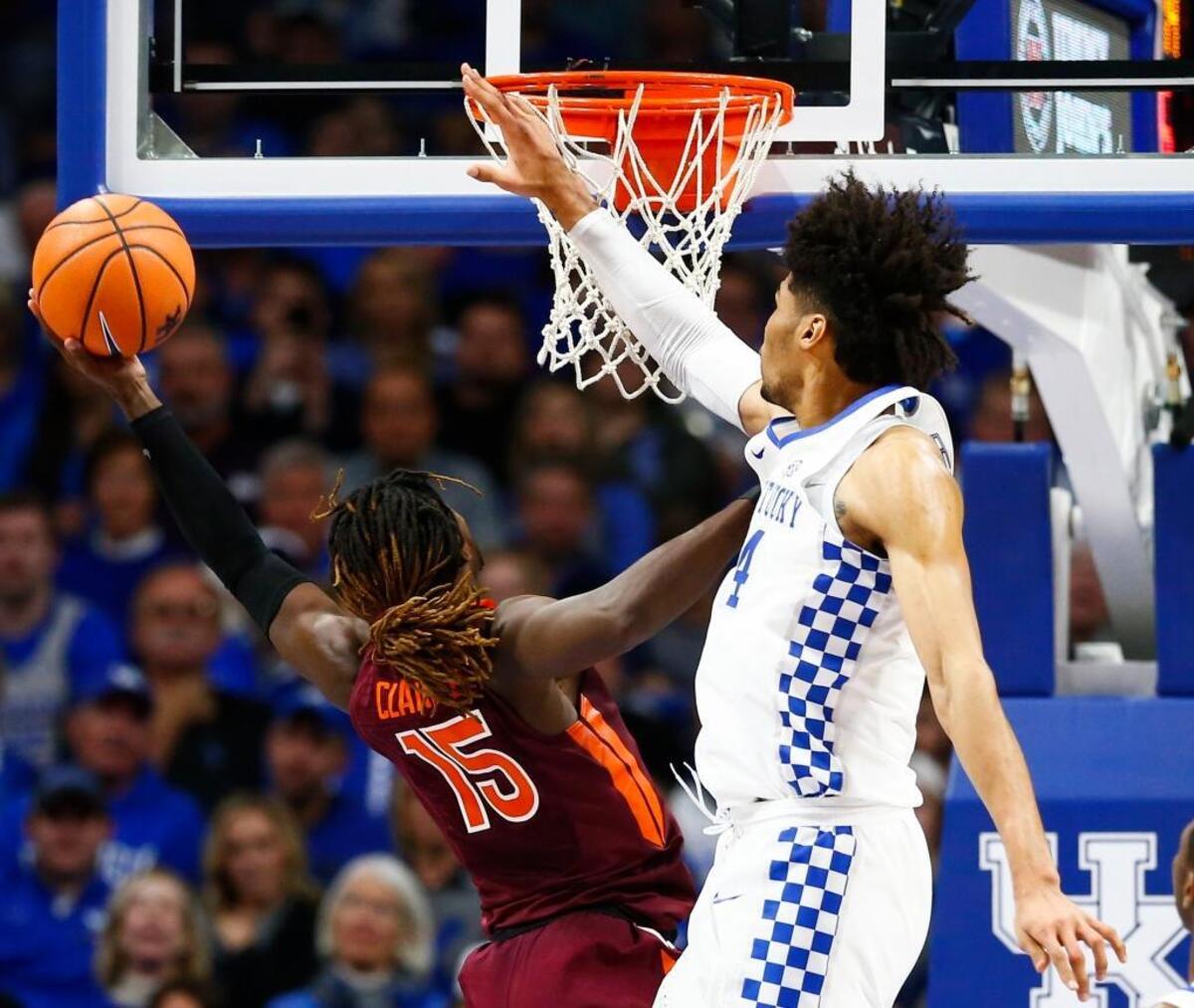 Kentucky center Nick Richards tried to block the shot of Virginia Tech forward Chris Clarke in UK’s 93-86 win over the Hokies in Rupp Arena. Louisville’s interior length and shot blocking figure to be a major challenge for the UK freshman.