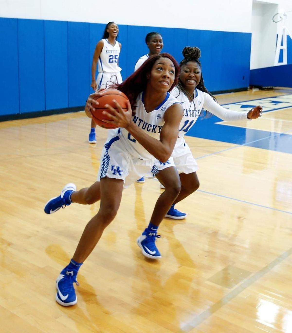 Freshmen forward Dorie Harrison, with ball, and guard Kameron Roach are among six newcomers on the Kentucky women’s basketball team this season.