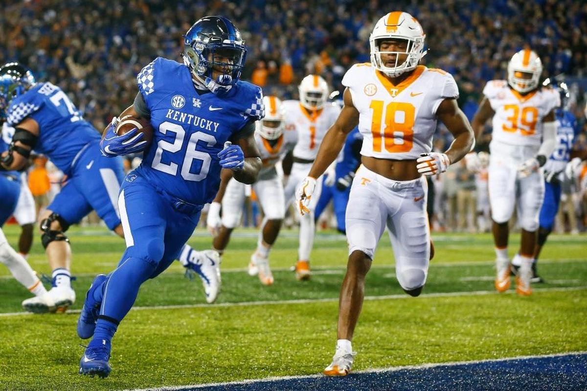 Star running back Benny Snell (26) is one of 17 starters returning for Kentucky from a team that won seven games and played in the Music City Bowl in 2017.