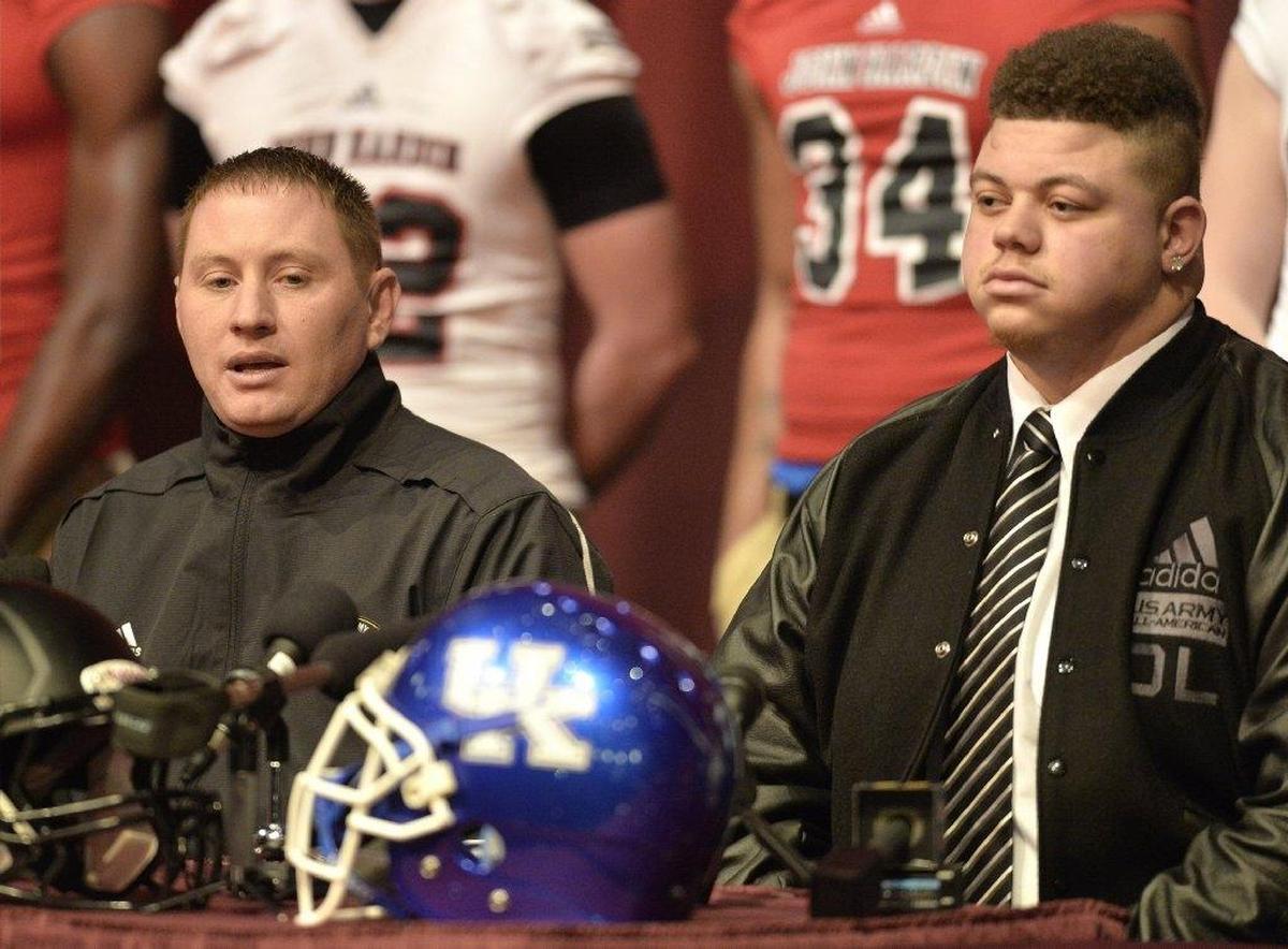Matt Elam, right, on the day he announced he was turning down scholarship offers from Alabama, Tennessee, Ohio State and Notre Dame, among others, to choose Kentucky.