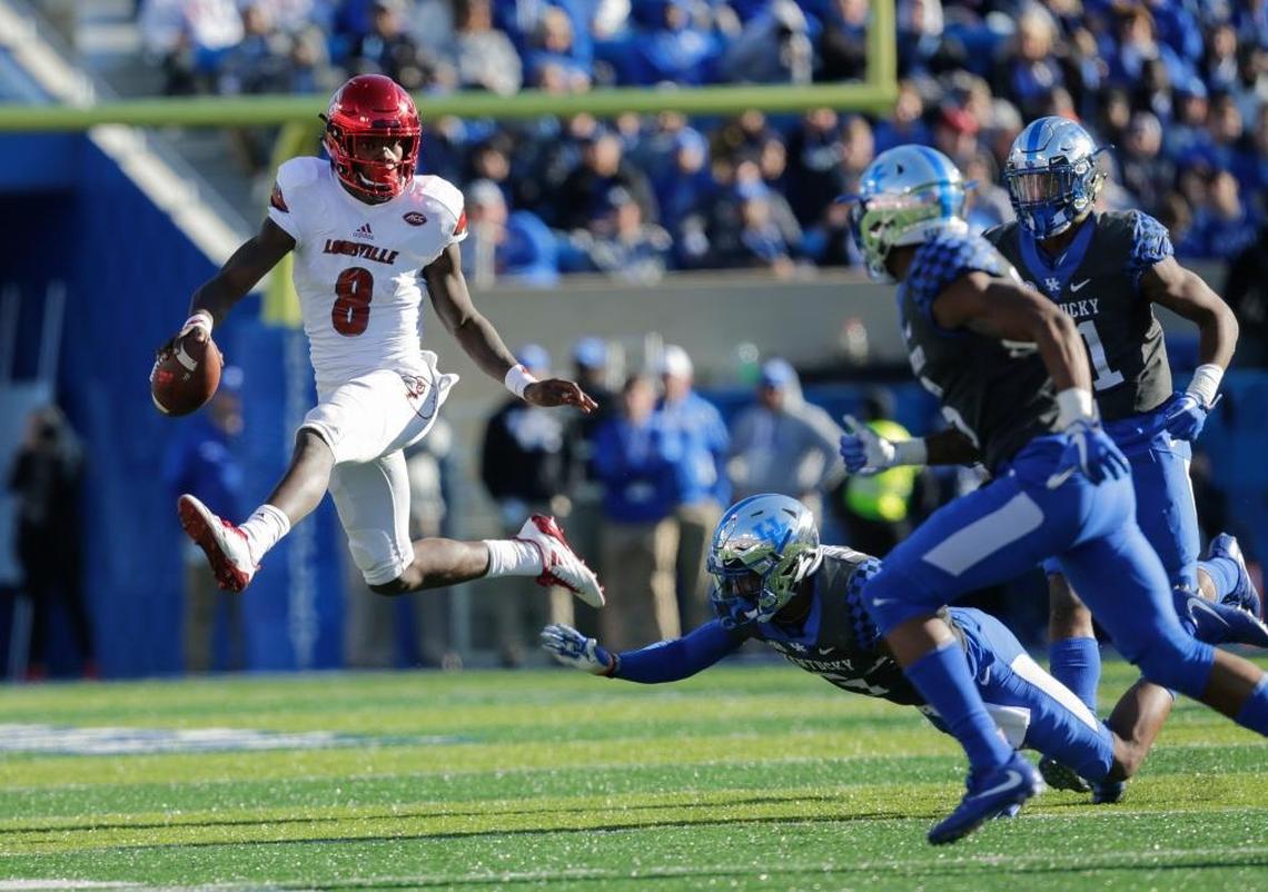 Louisville quarterback Lamar Jackson (8) finished second in 2017 Lexington Herald-Leader Kentucky Sports Figure of the Year voting after winning the award for 2016.