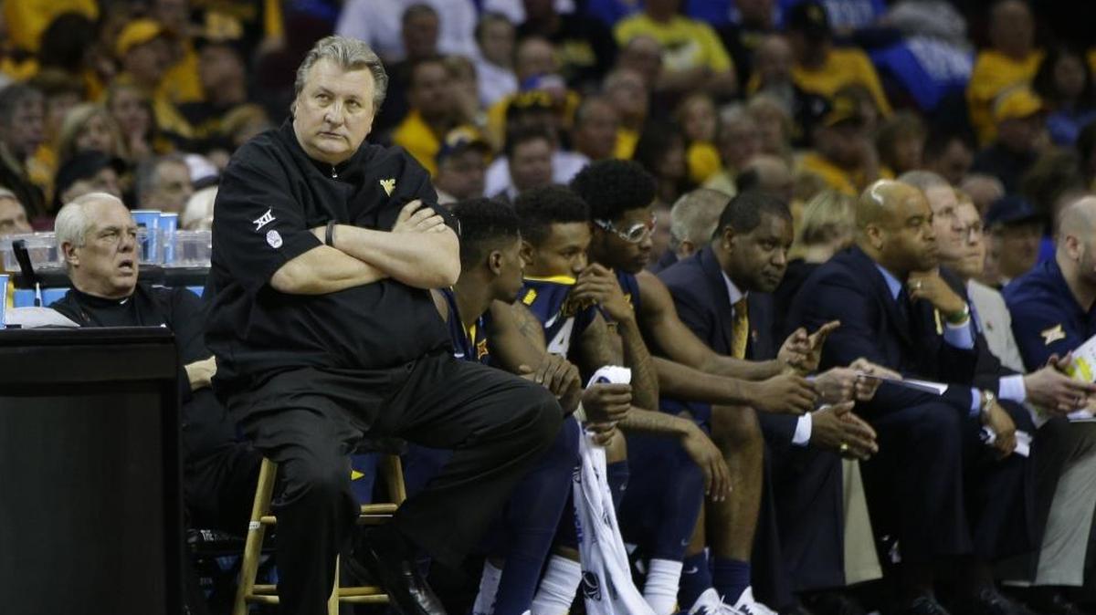 West Virginia Coach Bob Huggins could only sit quietly and watch as Kentucky obliterated the Mountaineers 78-39 in the 2015 NCAA Tournament round of 16 at Quicken Loans Arena in Cleveland.