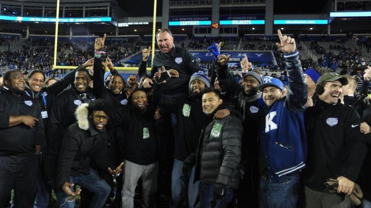 Former Kentucky Coach Rich Brooks was cheered by his members of his three bowl-winning Kentucky teams - 2006, 2007 and 2008 - during a reunion at halftime of this year’s UK-Tennessee football game at Kroger Field.