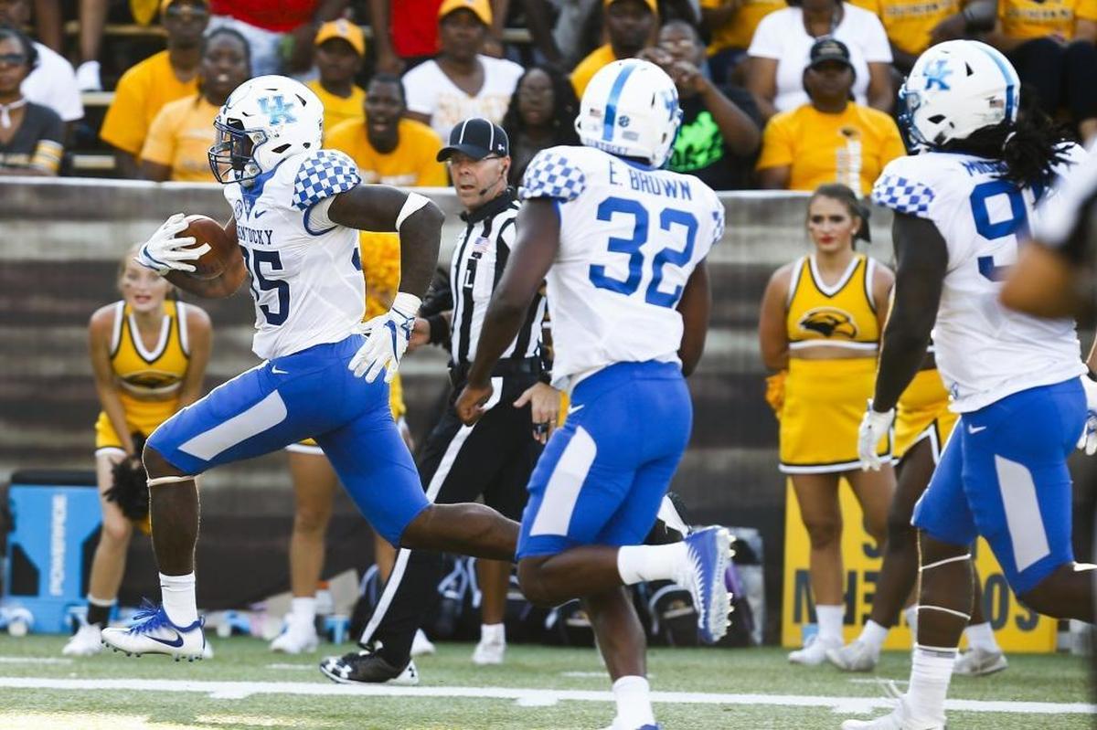 Kentucky outside linebacker/rush end Denzil Ware, with ball, had two quarterback sacks and a pass interception last week at Vanderbilt while logging only 17 snaps on the field.