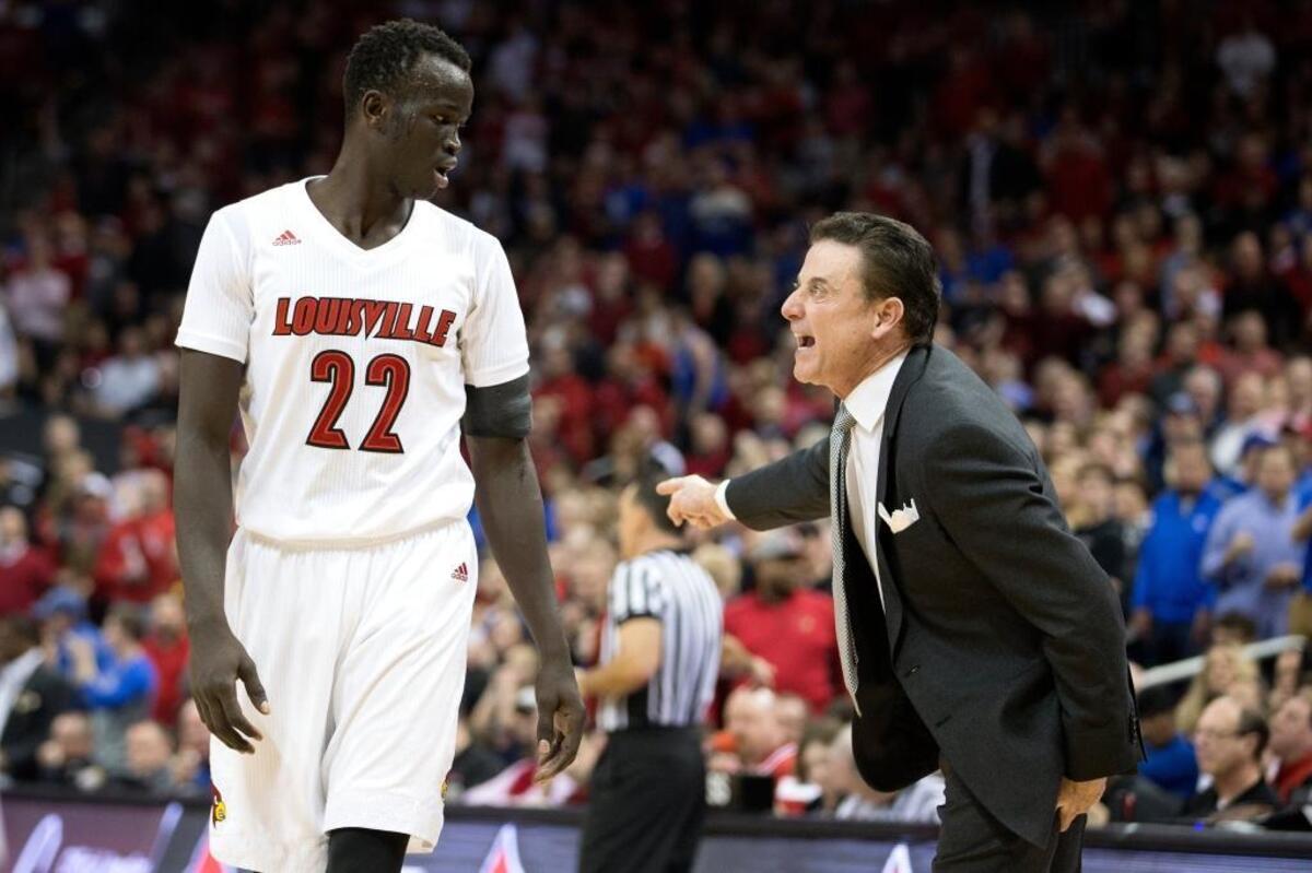 Rick Pitino, right, is gone, but Deng Adel is back from the Louisville team that beat Kentucky 73-70 last season in the KFC Yum Center. Adel had 18 points, six rebounds and two assists in the win.