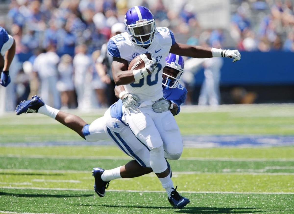 Kentucky safety Darius West made a tackle in the 2016 Blue-White Game. If the junior from Lima, Ohio, can stay healthy, UK defensive backs coach Steve Clinkscale says “he’s going to bring a physical nature to the secondary - which we need.”