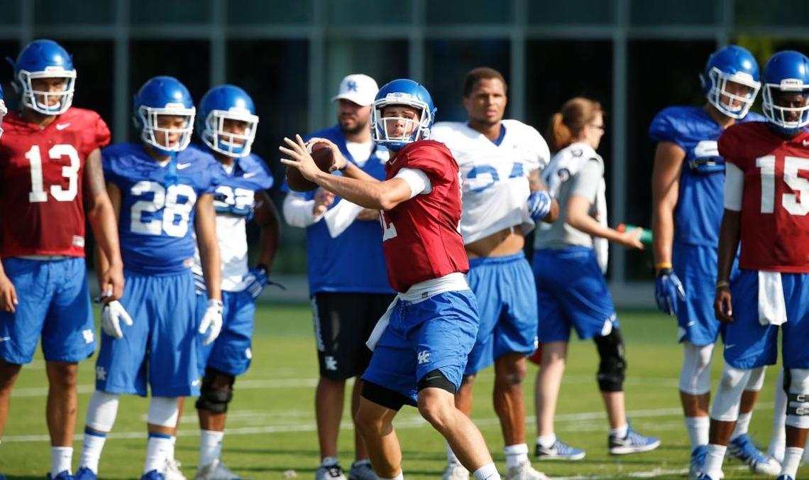 Quarterback Gunnar Hoak threw a pass during a University of Kentucky football practice last August. As a senior at Dublin Coffman High School in Ohio, Hoak threw for 1,798 yards and 14 touchdowns.