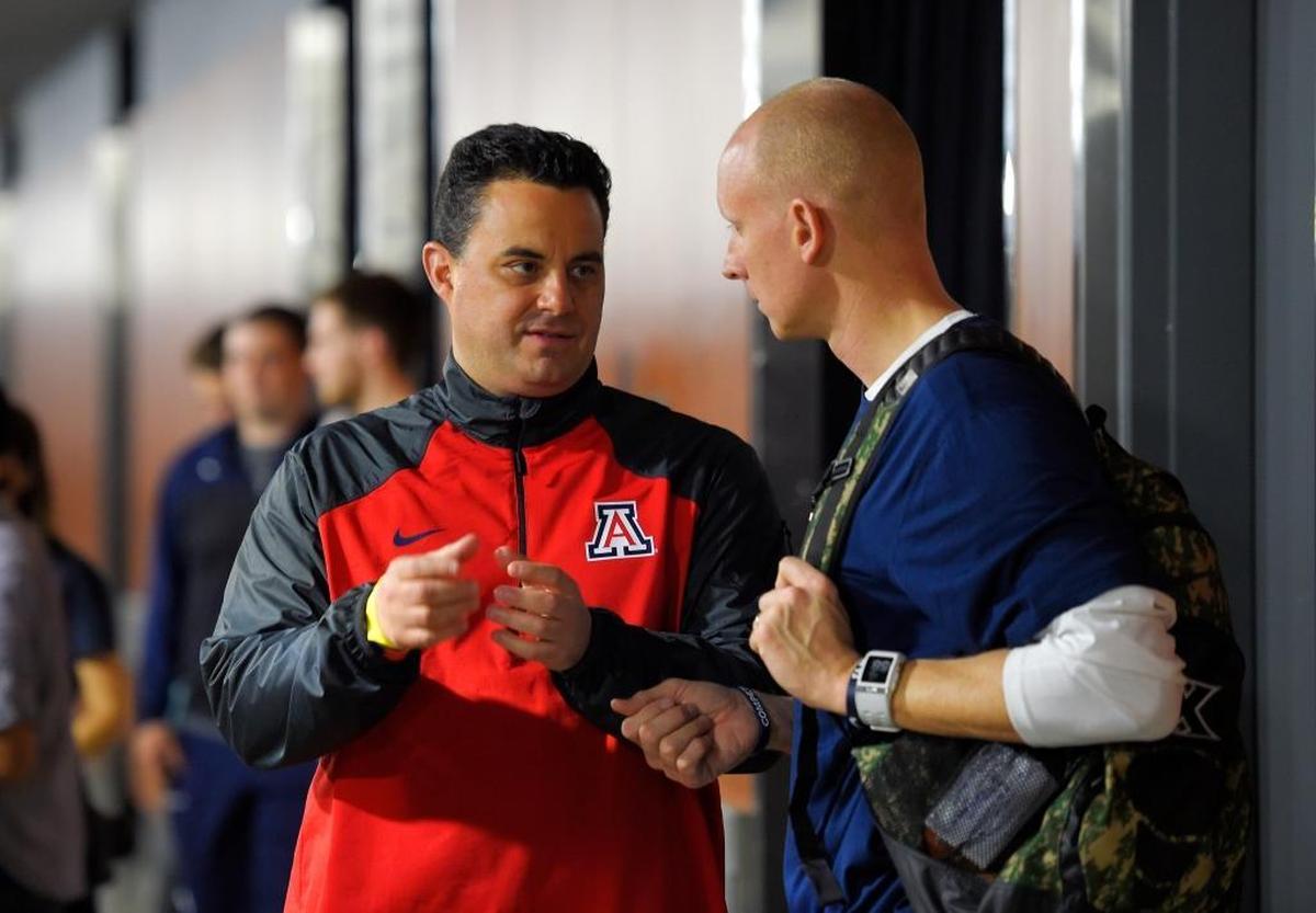 Xavier Coach Chris Mack, right, has ties to the city of Louisville. His wife, the former Christi Hester, was a star high school basketball player at Holy Cross High School in The Ville.