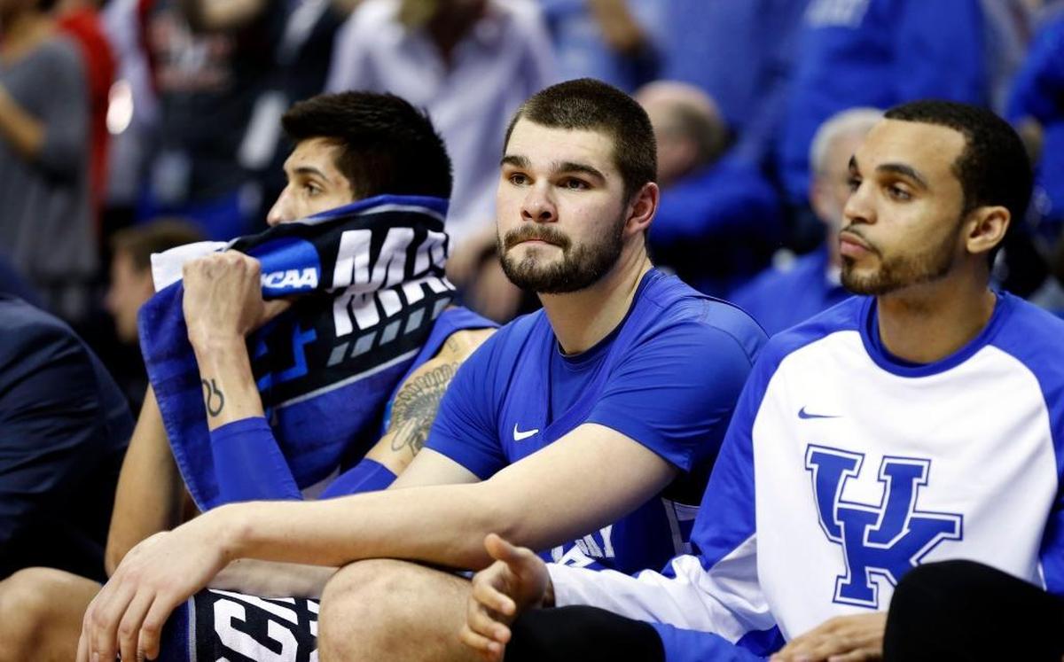 Kentucky sophomore Isaac Humphries, center, watched the final seconds of UK’s 75-73 loss to North Carolina in the 2017 NCAA Tournament South Region finals tick off the clock in Memphis. It turned out to be the final time Humphries wore the Kentucky uniform.