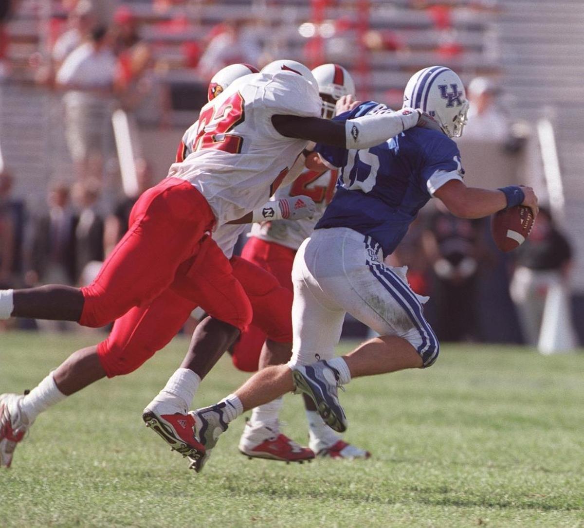 Louisville’s Donte Andrews tackled Kentucky quarterback Dusty Bonner during U of L’s 56-28 victory over UK in 1999. In winning, the Cardinals spoiled the unveiling of the renovated Commonwealth Stadium.