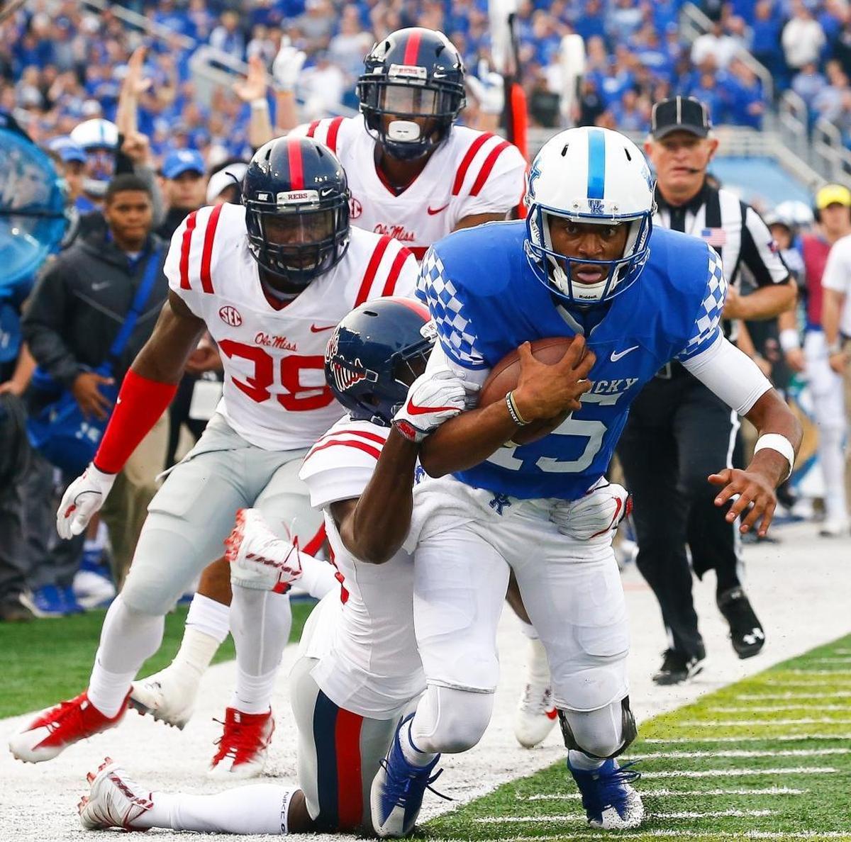 Kentucky quarterback Stephen Johnson, with ball, is UK’s second-leading rusher (304 net yards) this season. “He’s a running quarterback and can extend plays,” Vanderbilt Coach Derek Mason said of Johnson.