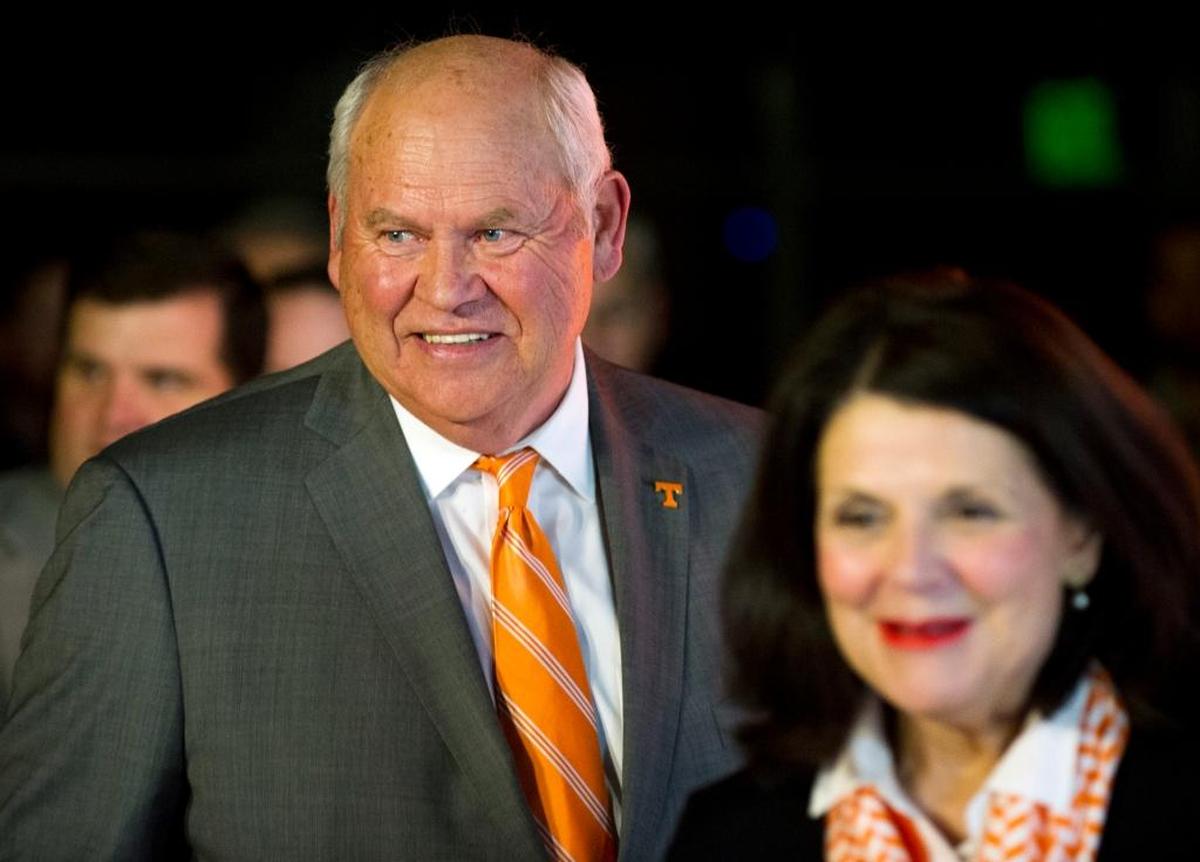 Phillip Fulmer follows University of Tennessee Chancellor Beverly J. Davenport into a press conference where Fulmer was announced as UT’s acting athletics director. The university placed former AD John Currie on paid leave amid what has been a tumultuous football coaching search.