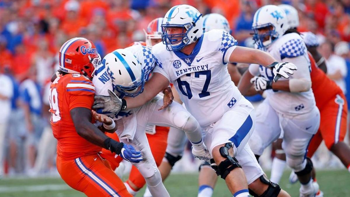 Kentucky left tackle Landon Young (67) was expected to be one of the cornerstones on the 2018 UK offensive line before a torn ACL ended his 2018 season before it began.