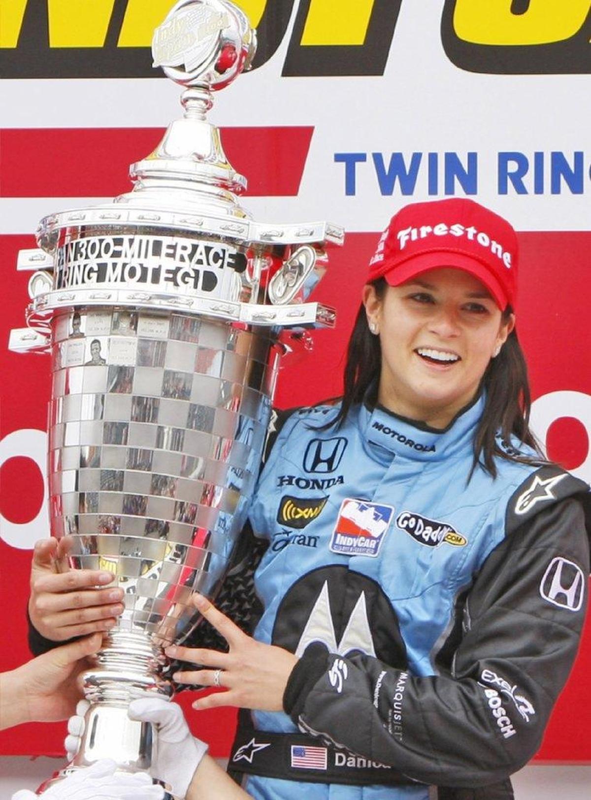 Danica Patrick became the first woman to win an IndyCar race when she claimed the winner’s trophy at Twin Ring Motegi Superspeedway in Japan on April 20, 2008.