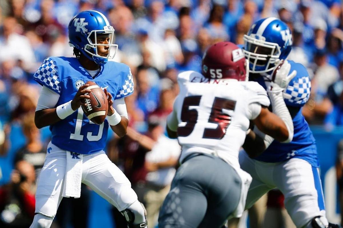 Kentucky quarterback Stephen Johnson (15) threw for a touchdown and ran for one to rally UK from 16-10 down to a 27-16 victory over Eastern Kentucky on Sept. 9, 2017. It is the most-recent meeting between the Wildcats and the Colonels.