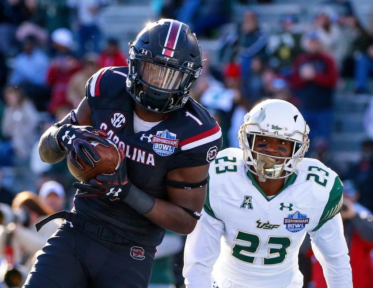 South Carolina’s Deebo Samuel, with ball, has already accounted for five touchdowns this season — two TD receptions, a TD run and two kickoff returns.