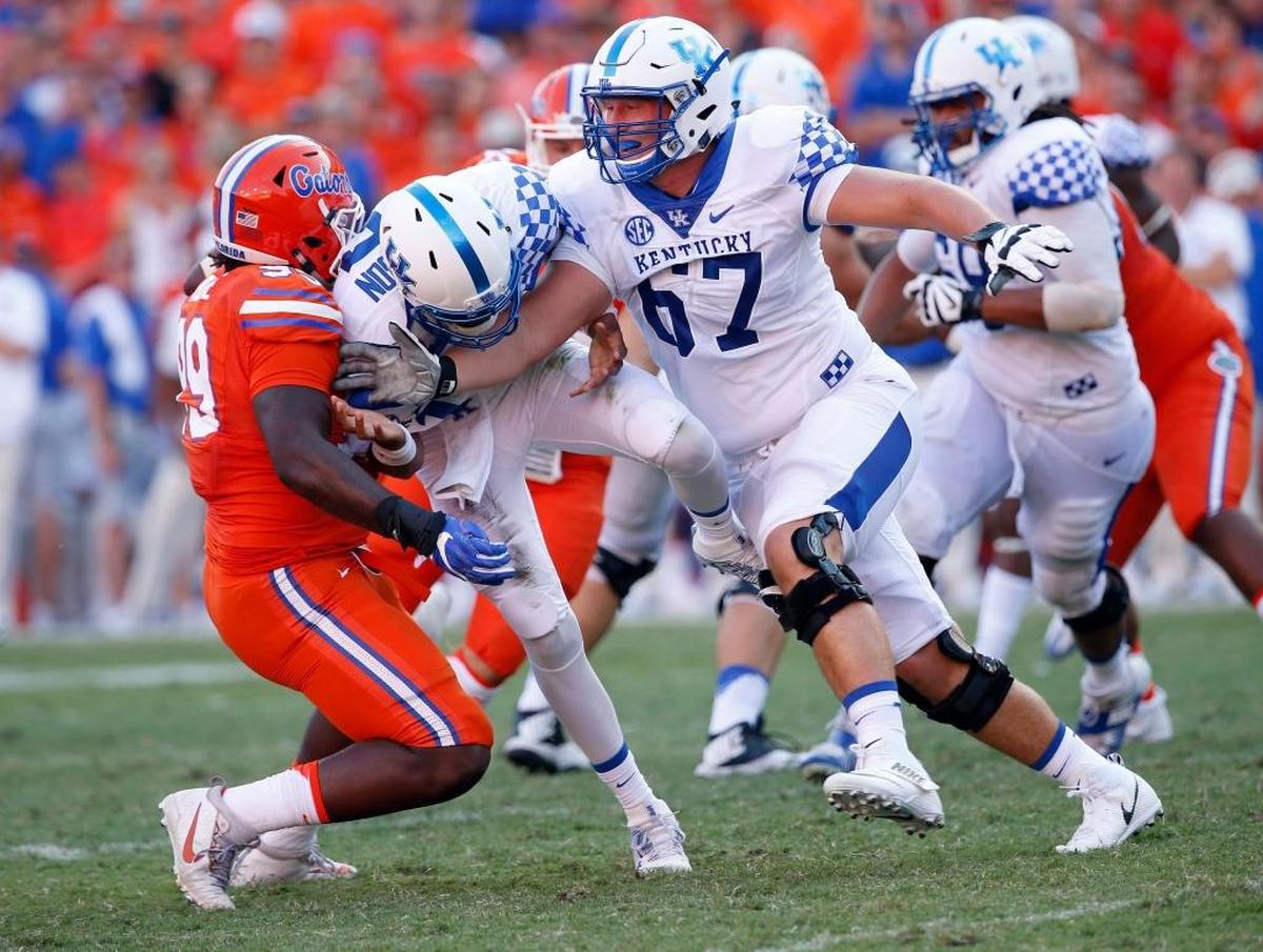 Kentucky’s Landon Young, No. 67, will likely inherit UK’s starting left tackle job now that senior Cole Mosier has suffered a season-ending knee injury. Last year as a true freshman, Young had 27 knockdown blocks while playing regularly in what was UK’s nine-man offensive line rotation.
