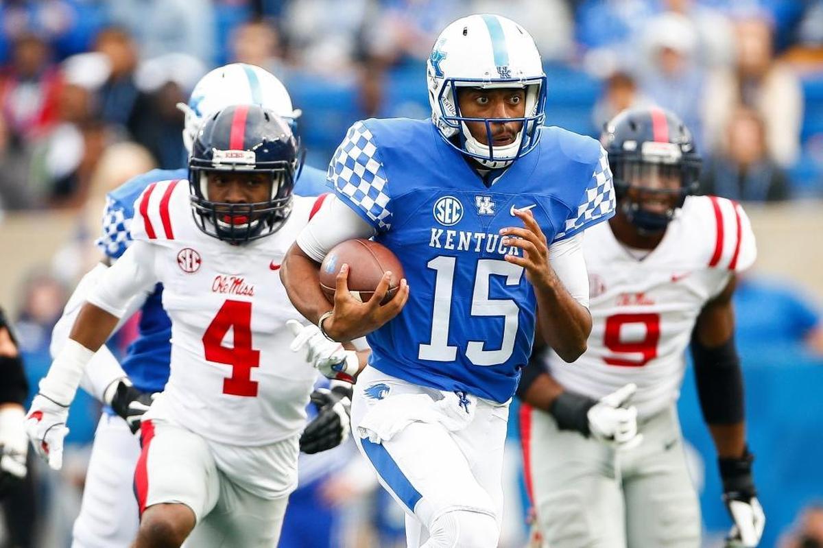 Stephen Johnson (15) will be seeking his fifth road victory as Kentucky starting quarterback when the Wildcats visit Vanderbilt on Saturday.