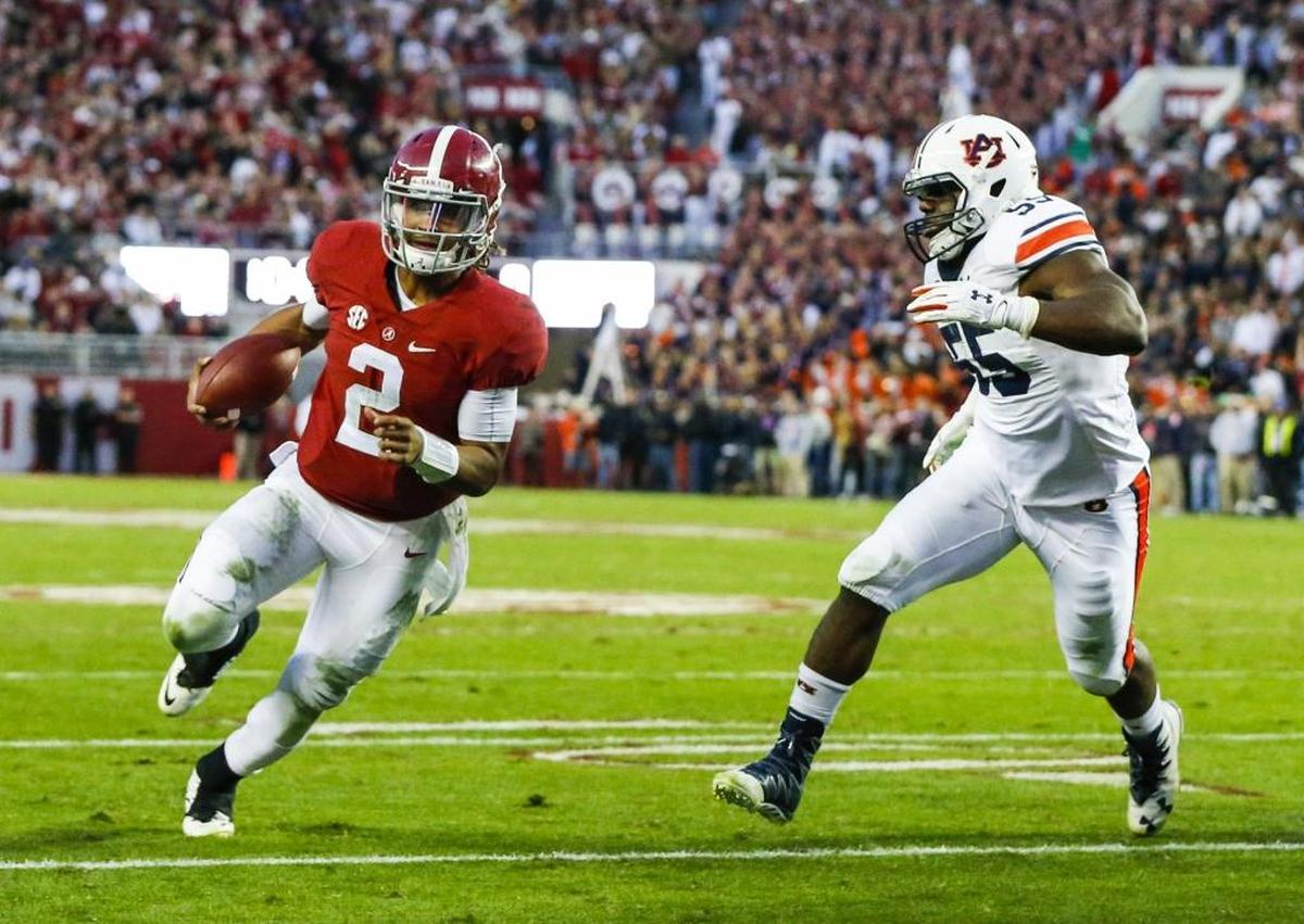 Alabama quarterback Jalen Hurts, No. 2 in red, ran for 954 yards and 13 touchdowns and passed for 2,780 yards and 23 TDs last year as a true freshman.