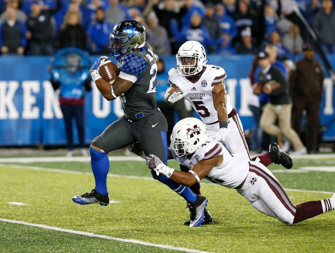 Kentucky Wildcats running back Benny Snell ran through the tackle attempt of Mississippi State’s Mark McLaurin en route to one of his 13 touchdown runs last season. No UK freshman ever ran for more TDs in a season.