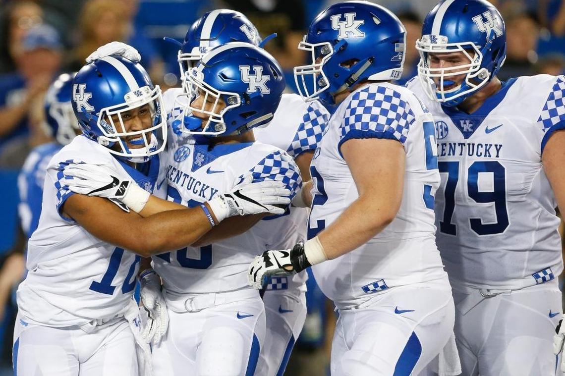 Kentucky freshman wide receiver Clevan Thomas Jr., No. 18, celebrated after catching a touchdown in UK’s Blue-White Spring Game. Wearing the same number that Jacob Tamme, Randall Cobb and Boom Williams wore with distinction at UK is “good pressure on me,” Thomas says.