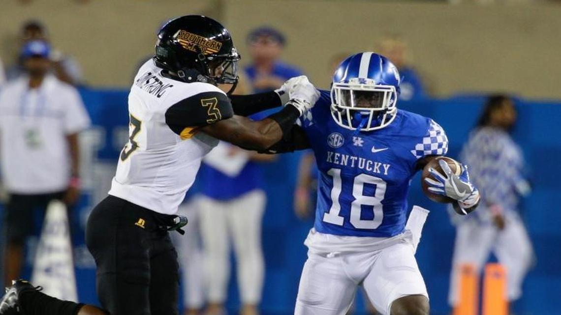 Boom Williams, No. 18, is one of a growing number of core players from Kentucky’s 2016 football TaxSlayer Bowl team who, for various reasons, will not play for the Wildcats in 2017 even though they had eligibility remaining.