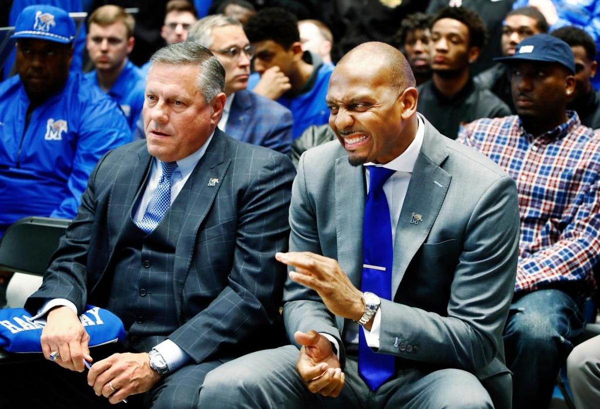University of Memphis Athletics Director Tom Bowen, left, sat with new men’s basketball coach Penny Hardaway at the news conference where the ex-NBA star was introduced as Tubby Smith’s replacement.
