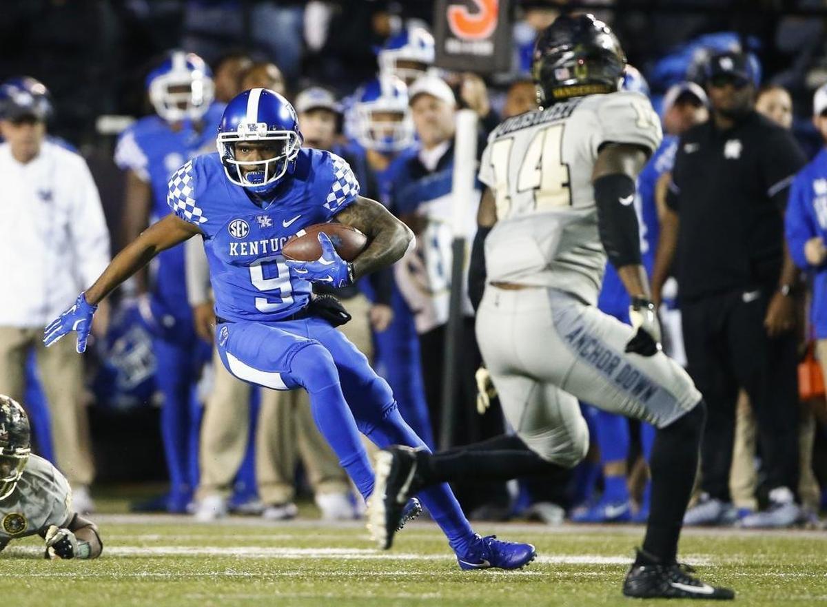 Kentucky senior wide receiver Garrett Johnson (9) will end his career as one of four UK wide receivers with more than 2,000 career receiving yards. The other three are Craig Yeast, Keenan Burton and Derek Abney.