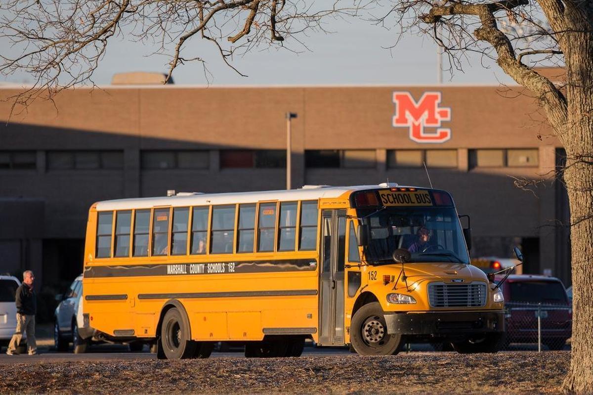 A school bus left Marshall County High School last Friday, the first day of classes at the school since a fatal shooting left two dead three days before.